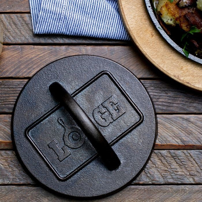 Black lid with 'LOCO' branding on a wooden surface