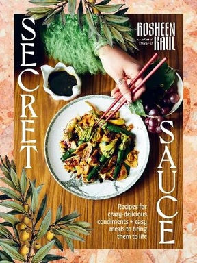 Book cover of 'Secret Sauce' by Rosheen Kaul with a dish and chopsticks on a wooden board.