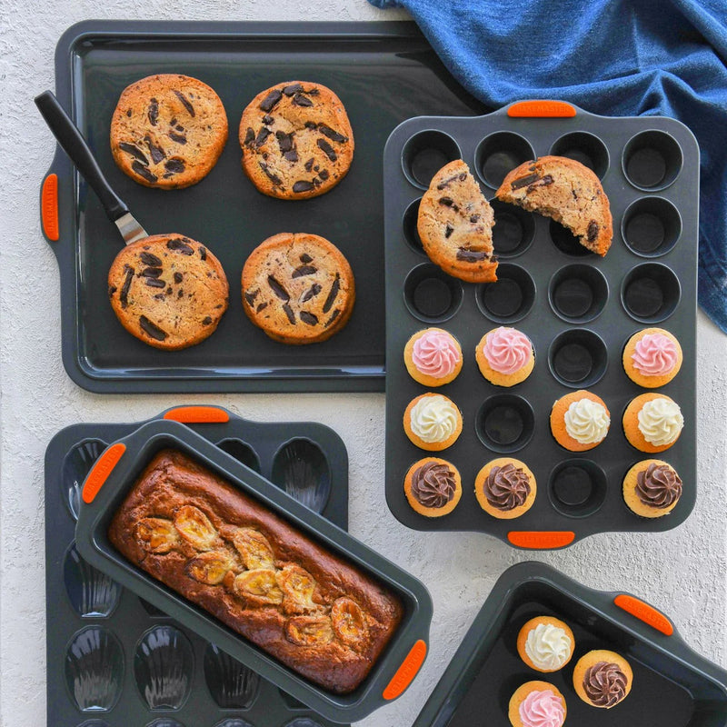 Bakemaster silicone bakeware collection with cookies, mini cupcakes, banana bread and shell pans