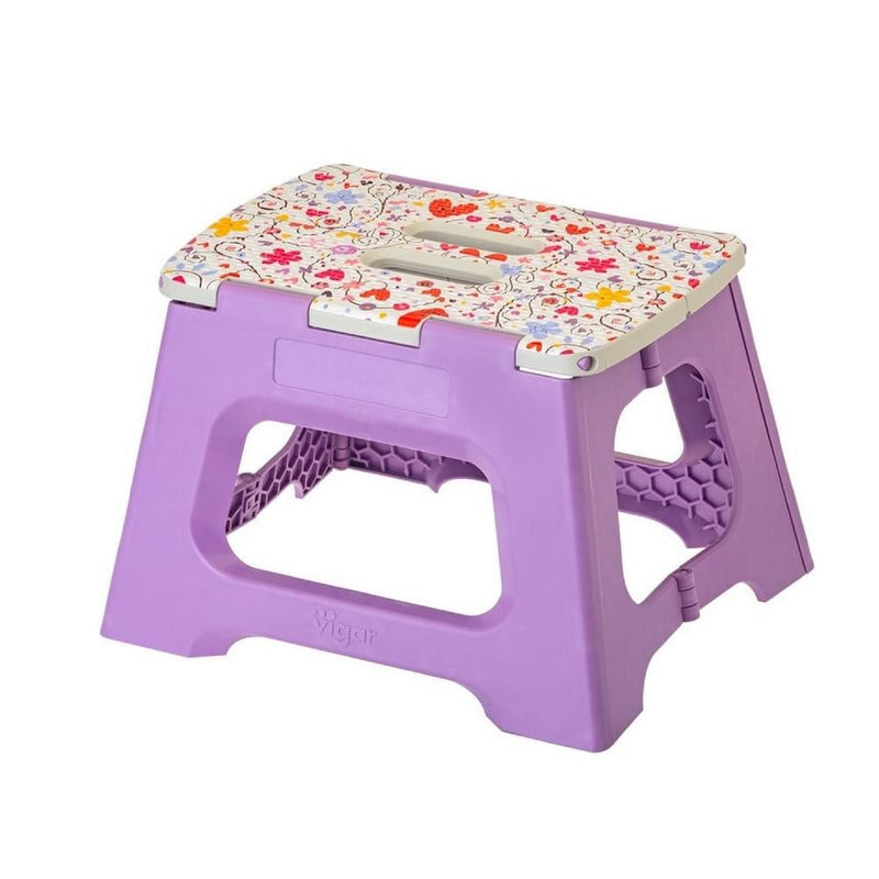 Purple step stool with floral patterned top on a white background