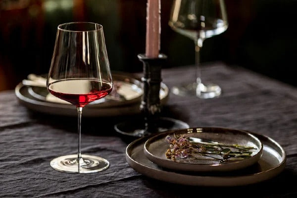 Luigi Bormioli Talismano wine glasses, 450ml, styled on a white dining table with other glassware