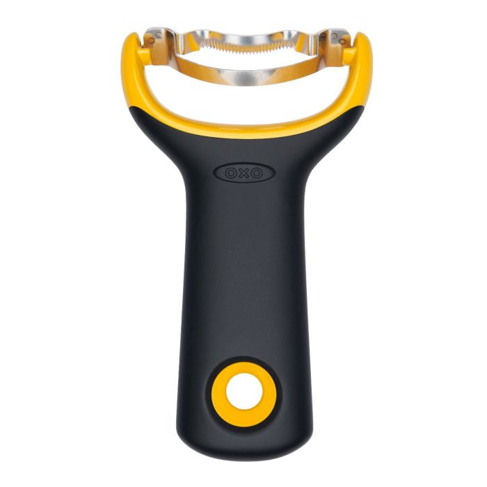 OXO Good Grips corn prep peeler with a black and yellow handle and a serrated steel blade