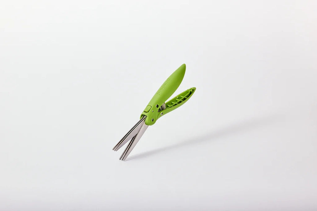 Prepara Herb Shears with lime green handles and twin stainless steel blades