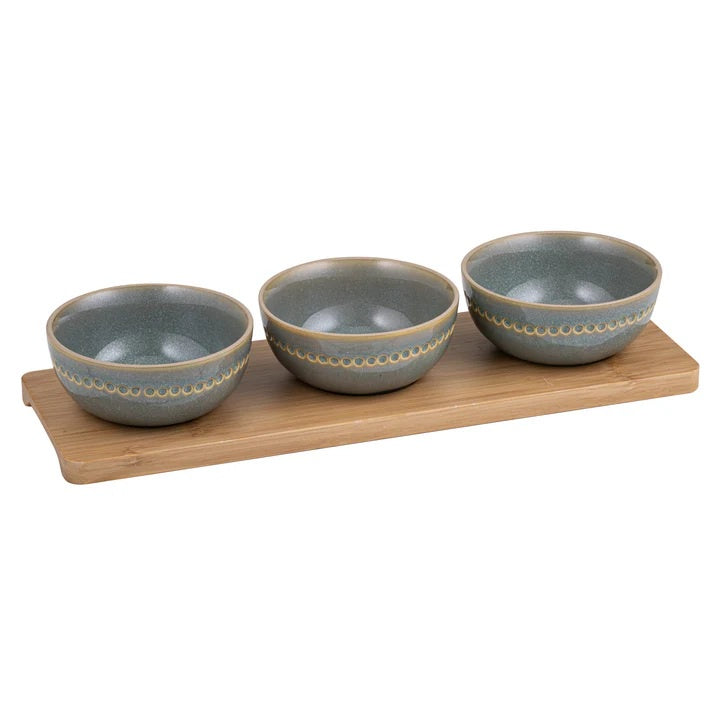 Ladelle Cameo four piece set with three grey-blue bowls on a bamboo tray