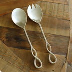 Old Mill Road Infinity salad servers, a spoon and fork with twisted loop handles