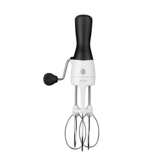 OXO Good Grips egg beater with a black crank handle and dual whisk heads