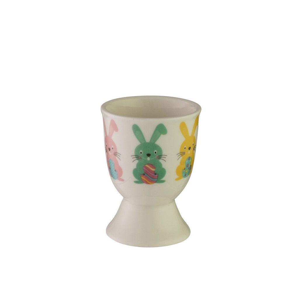 Avanti egg cup in cream with a pattern of coloured Easter bunnies holding eggs