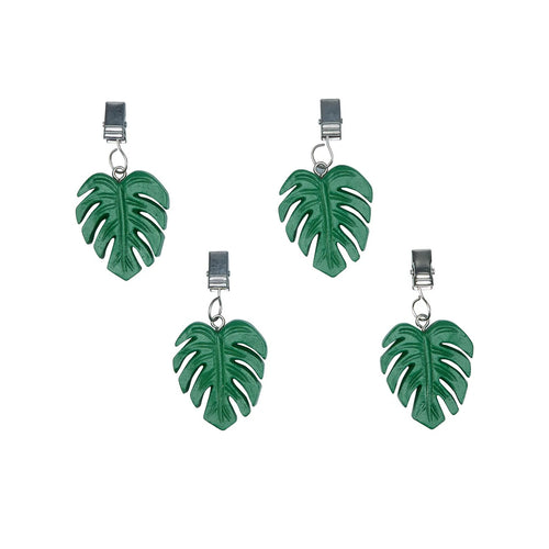 Alfresco Lane tablecloth weights, a set of four green monstera leaf-shaped clips