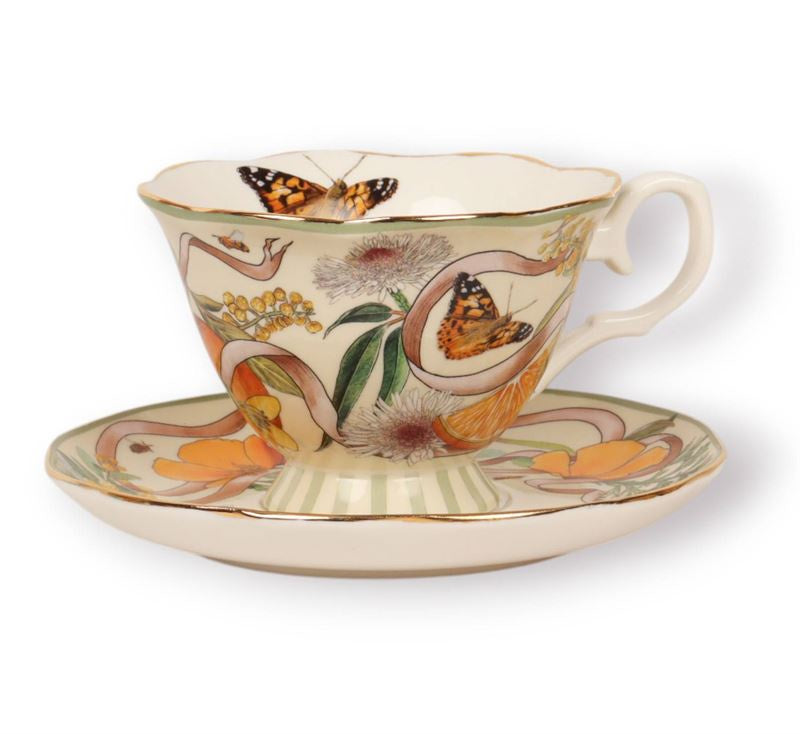 La La Land Golden Hour tea cup and saucer with a butterfly and floral pattern