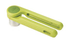Joseph Joseph Helix garlic press in lime green with a folding twist handle and a steel chamber