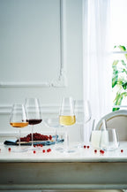 Luigi Bormioli Talismano wine glasses, 450ml, styled on a white dining table with other glassware