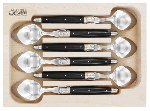 Andre Verdier Laguiole dinner spoon set, six with black handles, shown in a wooden tray