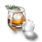 Zoku Crown ice mould set, a crown-shaped mould beside a clear ice crown in a glass of whisky with rosemary