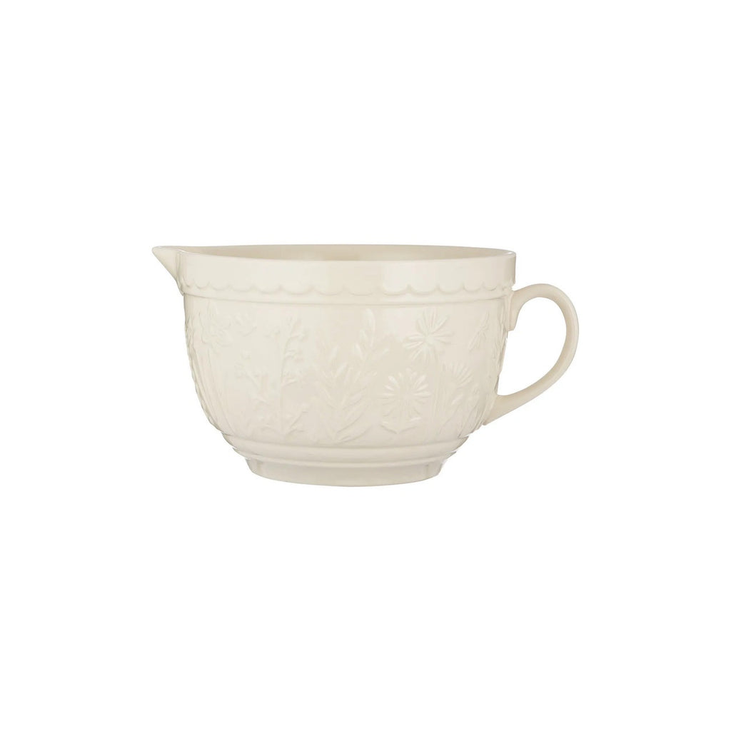 Mason Cash In The Meadow batter bowl in cream with embossed wildflower detail, a pouring lip and handle