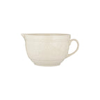 Mason Cash In The Meadow batter bowl in cream with embossed wildflower detail, a pouring lip and handle