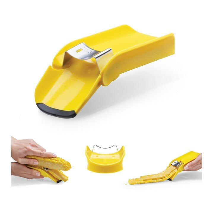 Dreamfarm Corpeel corn stripper in yellow, shown removing kernels from a corn cob