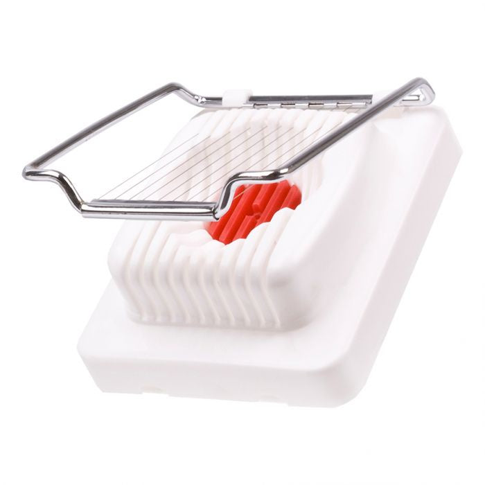 Appetito egg slicer in white with a steel wire cutting frame and a red pricker