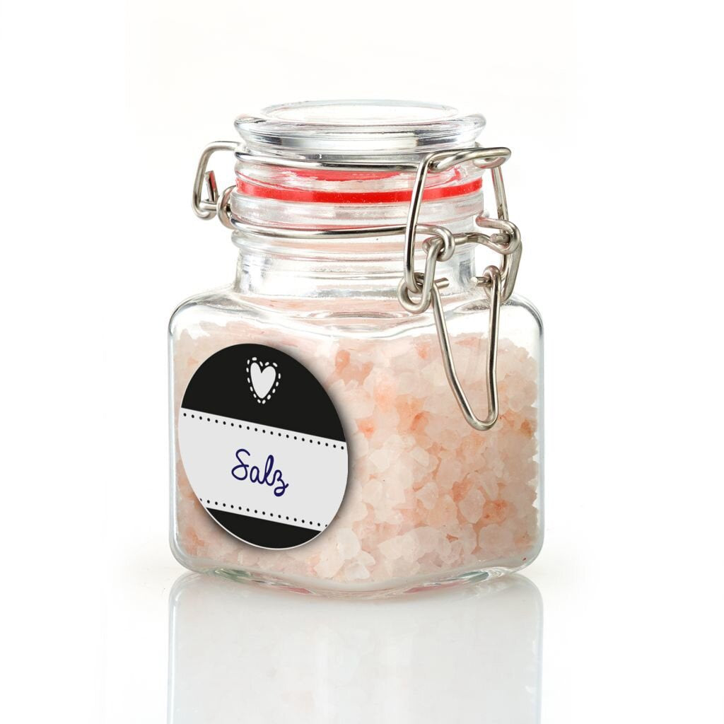 Westmark decorative round jar labels, shown applied to a small glass storage jar of pink salt