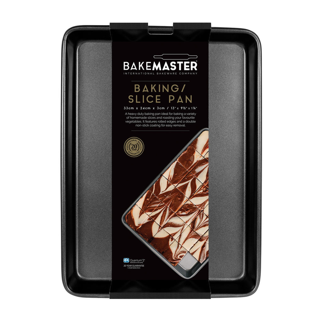 Bakemaster baking and slice tray in dark non-stick steel, shown in its branded packaging