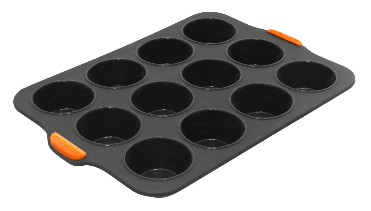 Bakemaster silicone 12 cup muffin pan in black with orange corner tabs