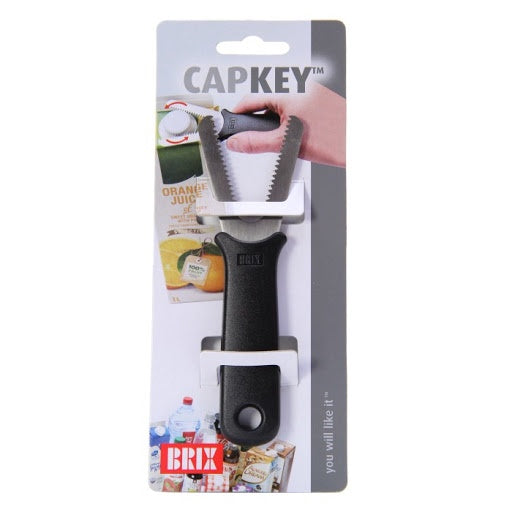 Brix Capkey screw cap opener in black with a serrated grip, on its retail card