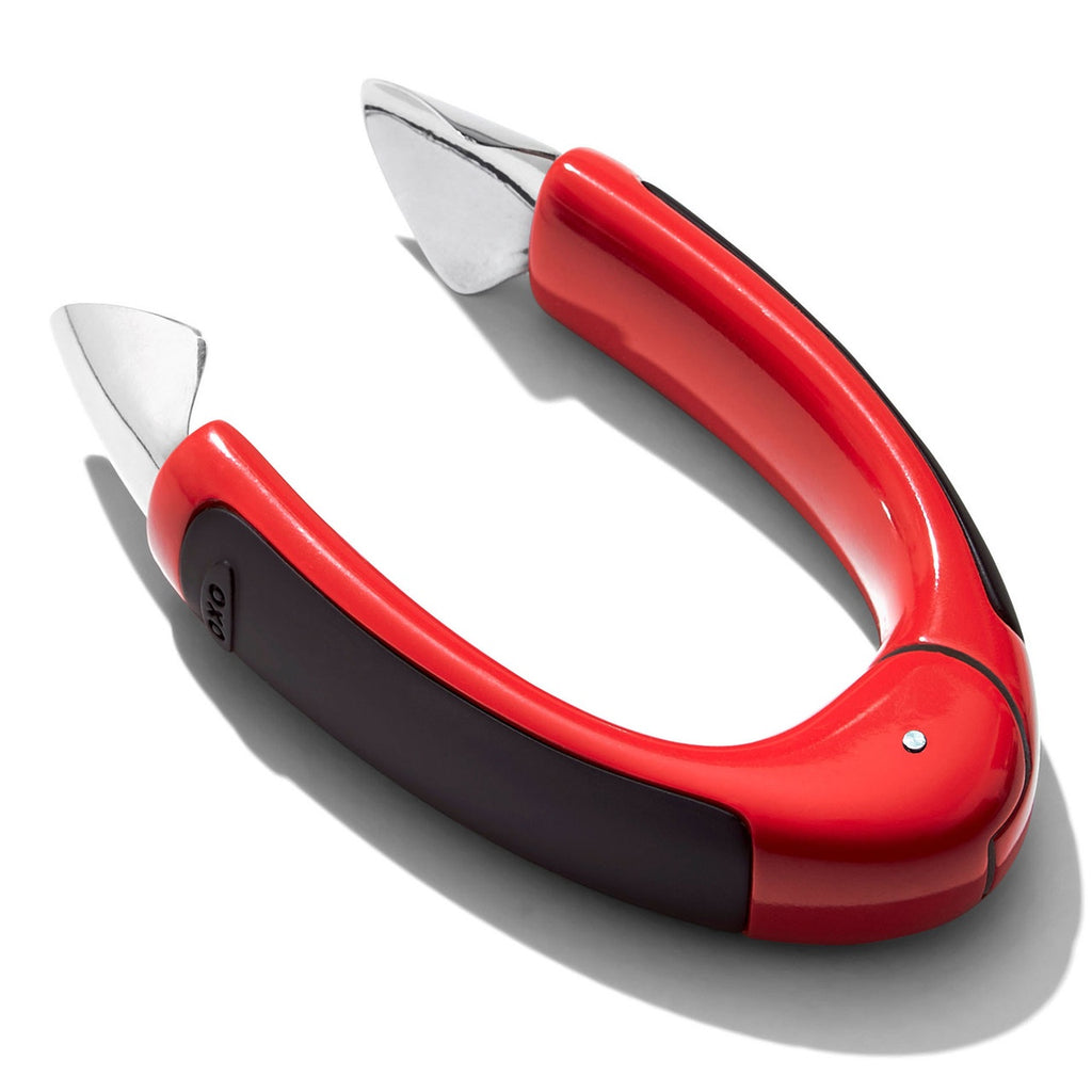 OXO Good Grips strawberry huller with a black handle and a steel scoop