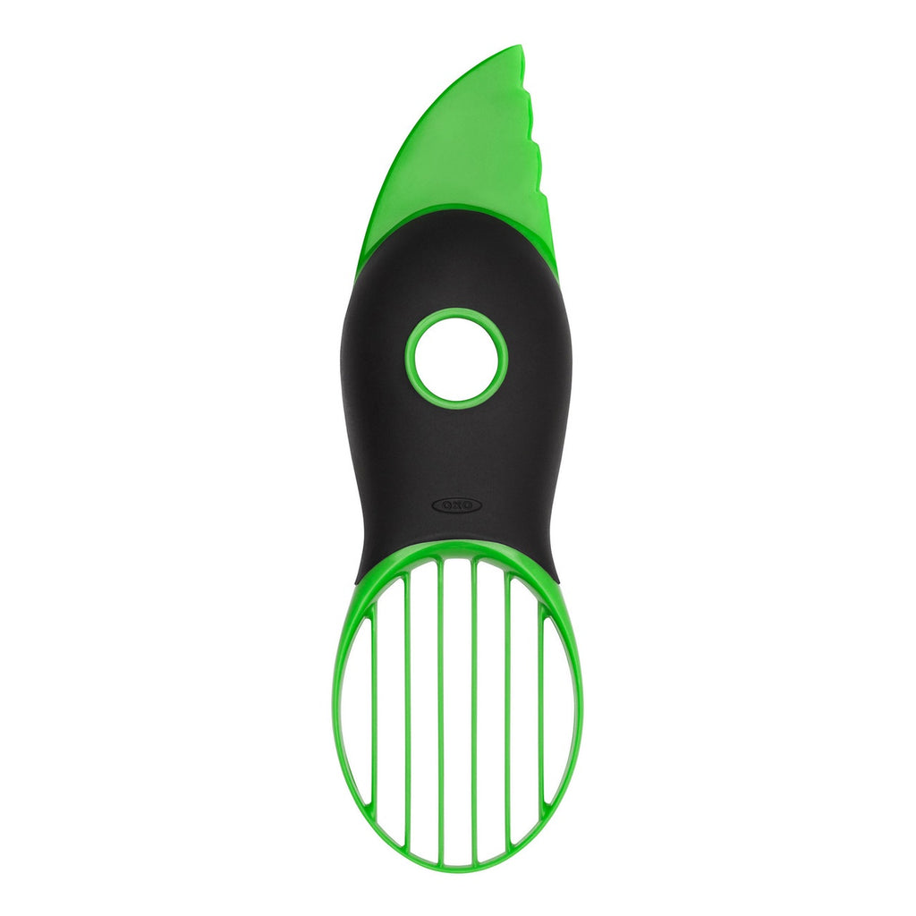OXO Good Grips 3-in-1 avocado slicer in green and black with a slicing head and a pit remover