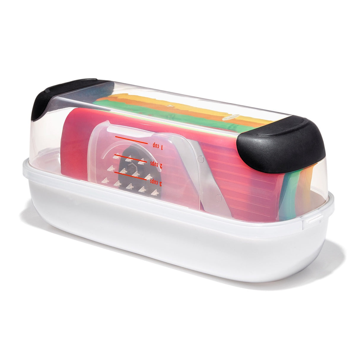 OXO Good Grips complete grate and slice set stored in a clear-lidded white container