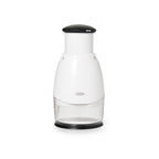 OXO Good Grips chopper in white with a black push top and a clear base