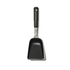 OXO Good Grips roast and fry scoop with a black handle and a curved steel scoop
