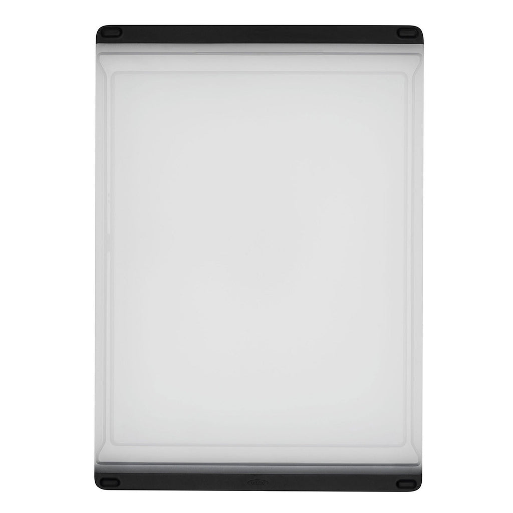 OXO Good Grips everyday cutting board in white and black with a textured non-slip edge
