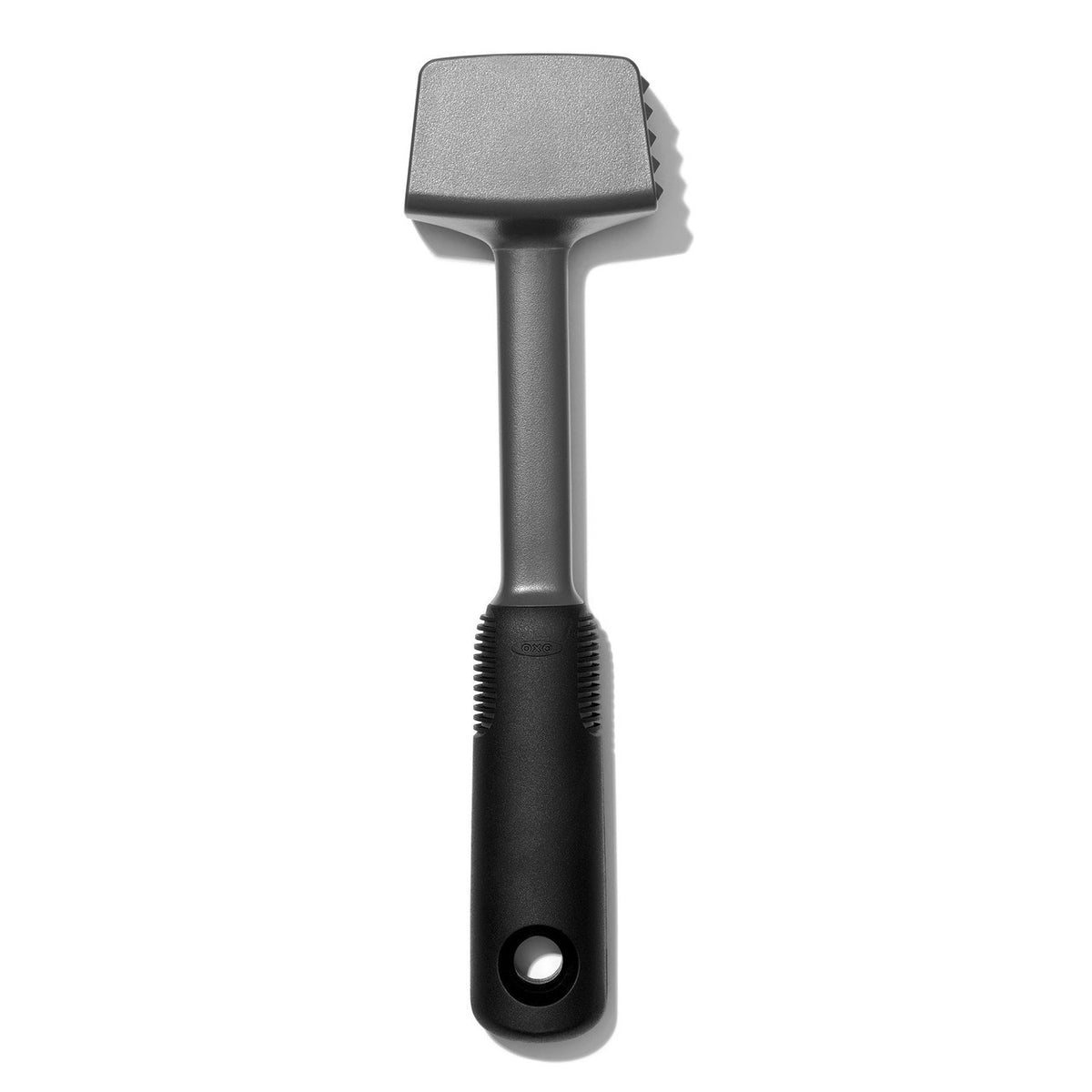 OXO Good Grips meat tenderizer in black with a textured tenderising head