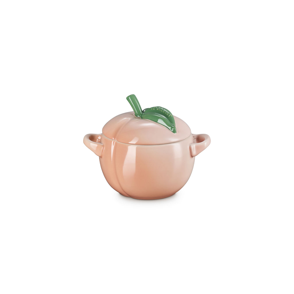 Le Creuset Peach cocotte, 580ml, in peach-shaped stoneware with leaf handles