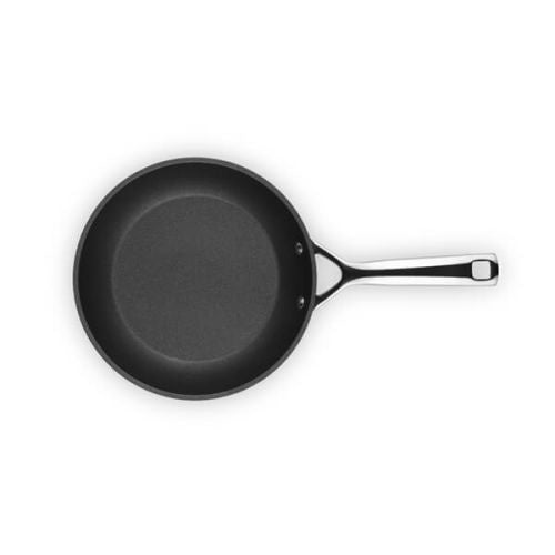 Le Creuset TNS shallow frying pan, 24cm, in black non-stick with a stainless steel handle