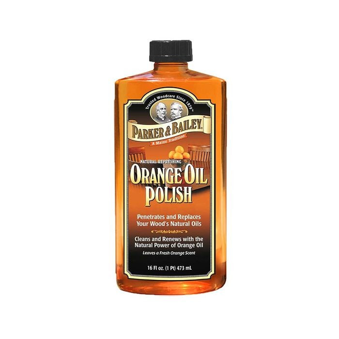 Parker & Bailey Orange Oil Polish, a 473ml bottle of amber oil with a black cap and label