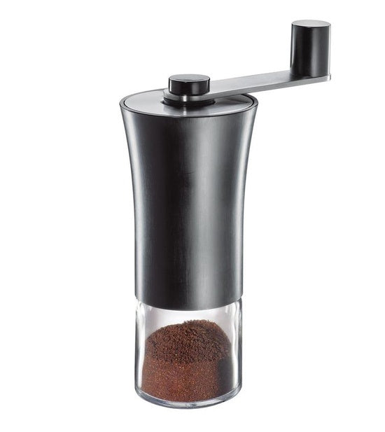 Zassenhaus Buenos Aires hand crank coffee grinder in black with a glass base holding ground coffee