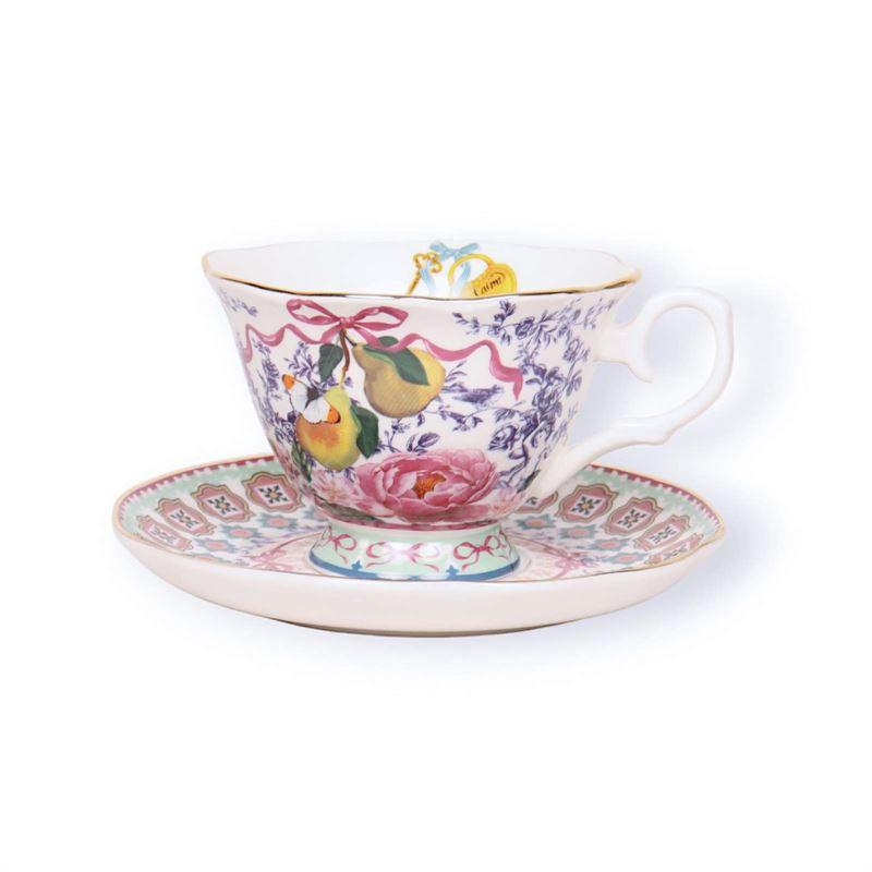 La La Land Je t'aime Paris tea cup and saucer with a pear and floral bow pattern