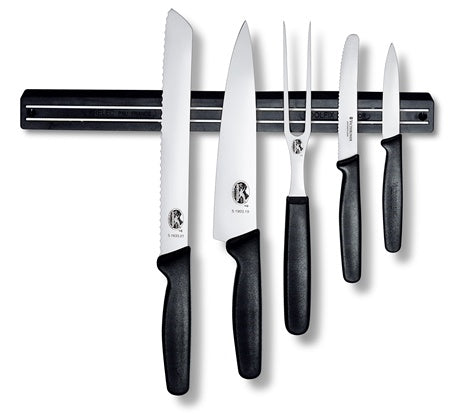 Victorinox magnetic knife bar in black, holding five black-handled knives and a carving fork