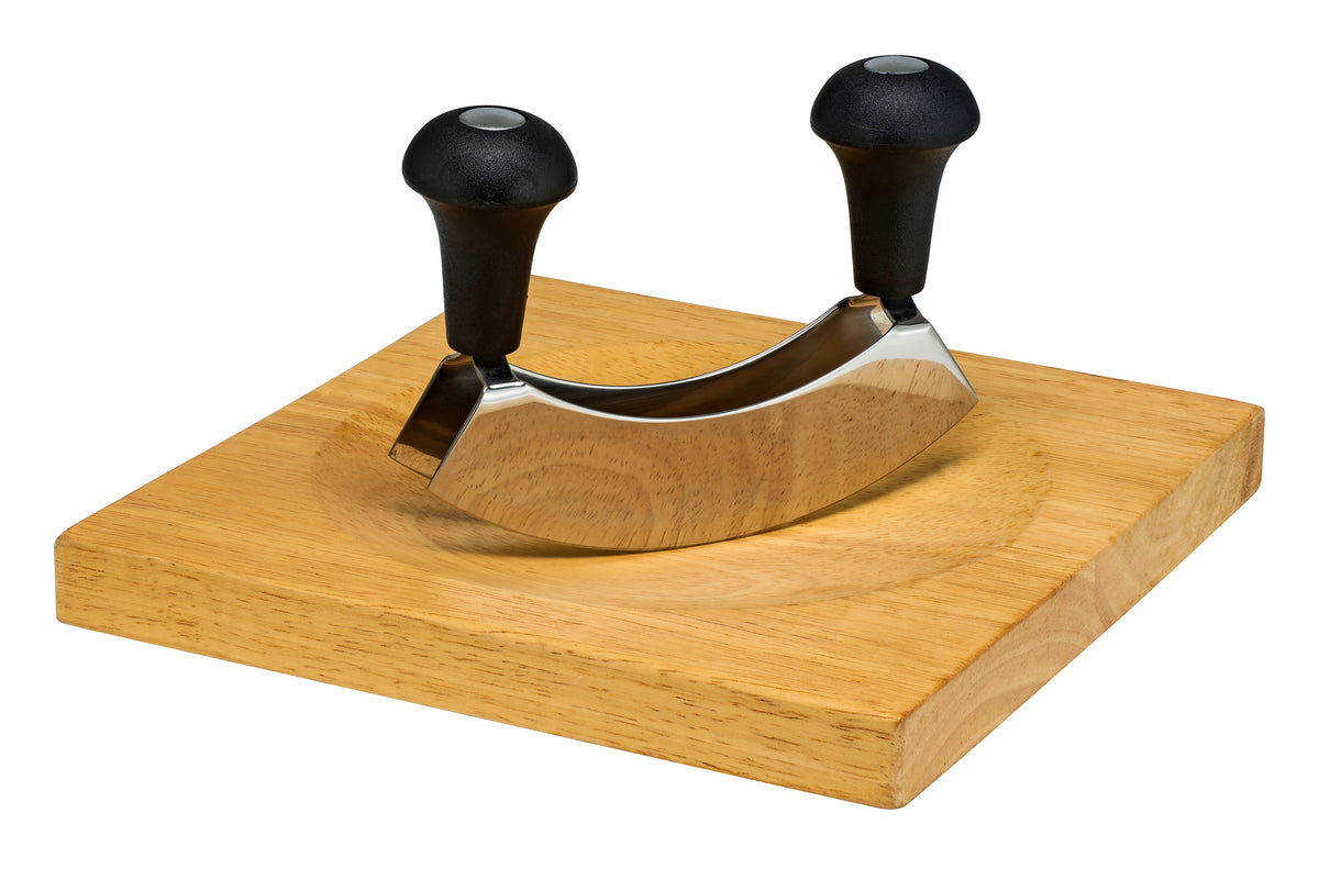 Avanti double blade mezzaluna with a chopping board set, 15cm, with black handles on a wooden board