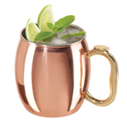 OGGI Moscow Mule copper mug with a gold handle, garnished with lime and mint
