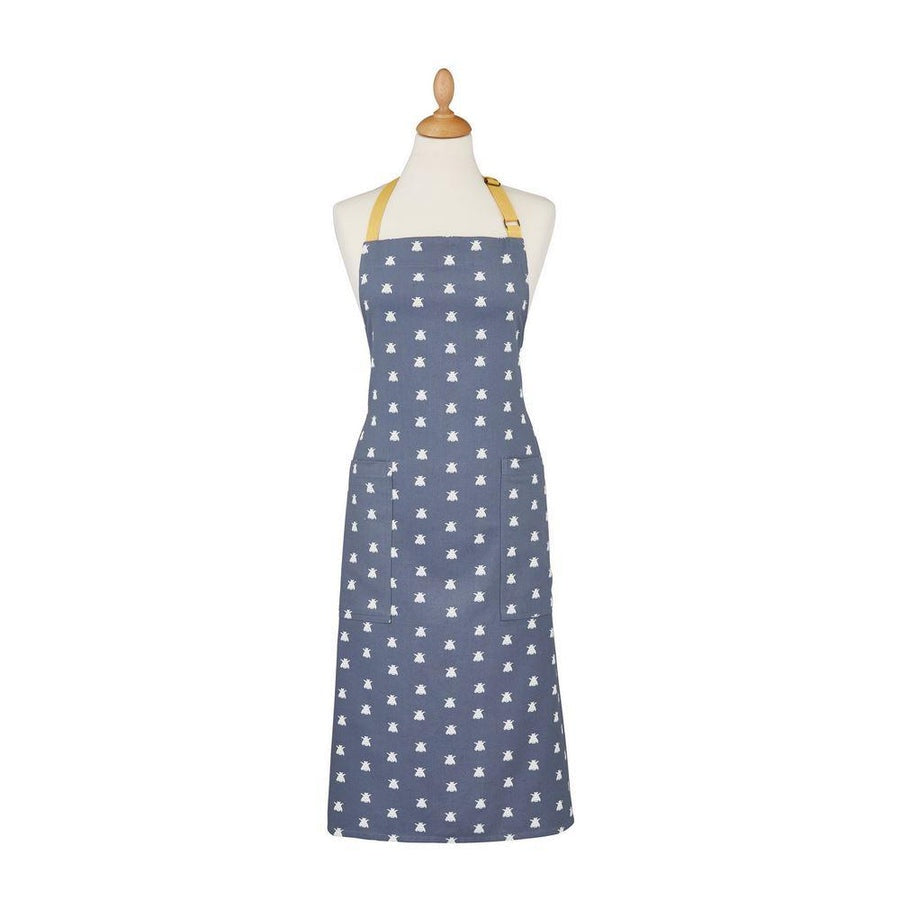 Ulster Weavers cotton apron with a bee print on navy blue, shown on a dress form