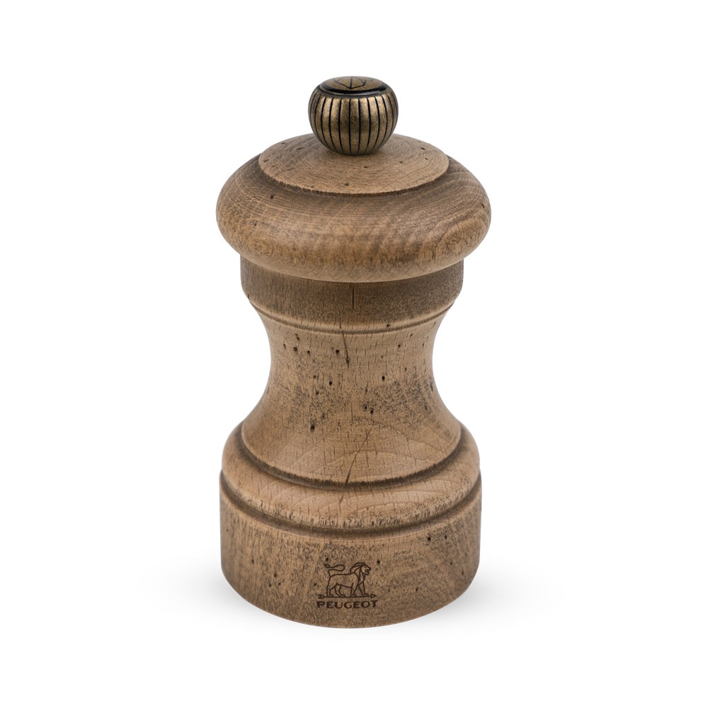 Peugeot Bistro Antique pepper mill in weathered natural wood with a metal knob, 10cm