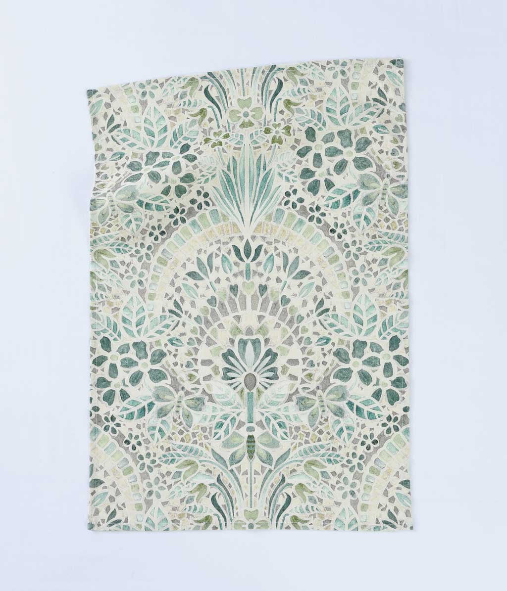 Andora linen tea towel with a pale green and white mosaic fan pattern