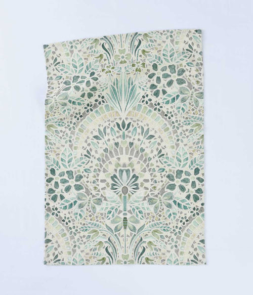 Andora linen tea towel with a pale green and white mosaic fan pattern