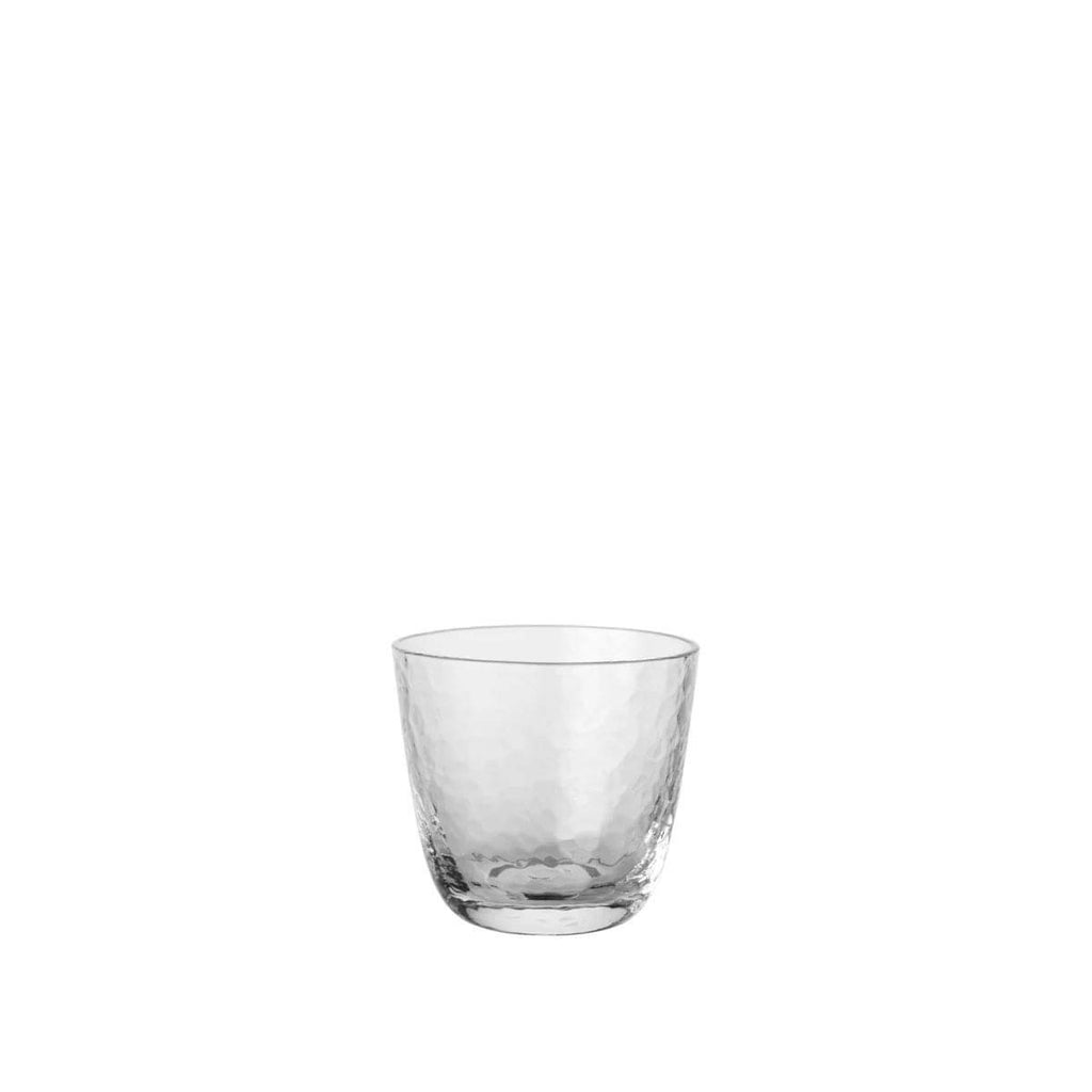 Broste hammered water tumbler in clear glass with a textured surface