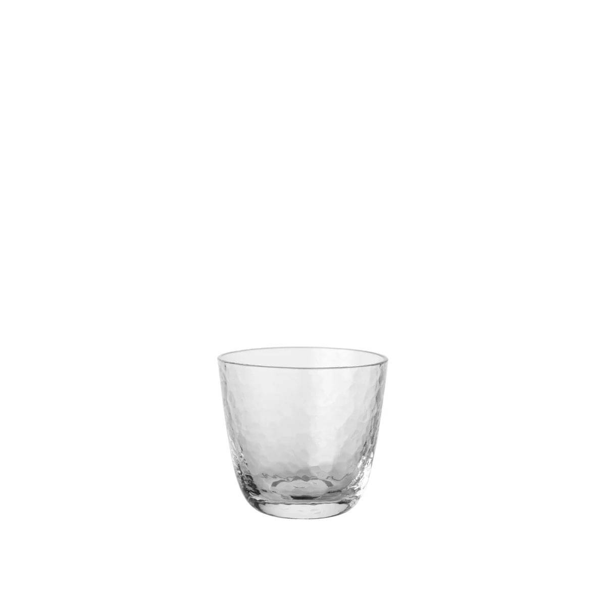 Broste hammered water tumbler in clear glass with a textured surface
