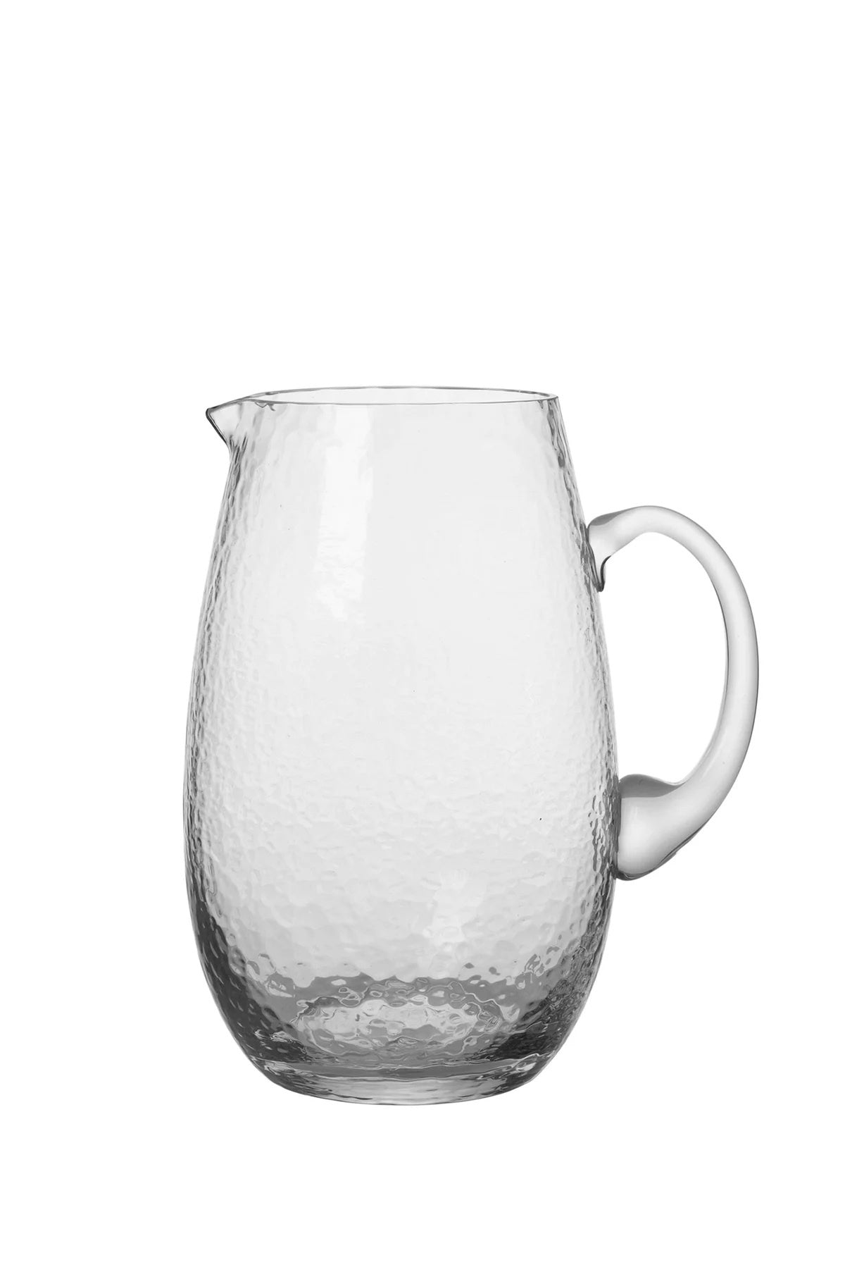 Broste hammered jug in clear glass with a textured surface and a handle
