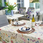 BenElke stain resistant Posie tablecloth with a floral print, styled on an outdoor dining table