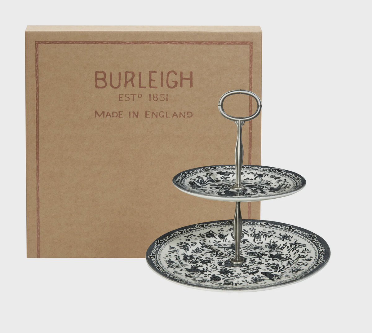 Burleigh Black Regal Peacock two tier cake stand with a black and white transferware pattern, shown in its box