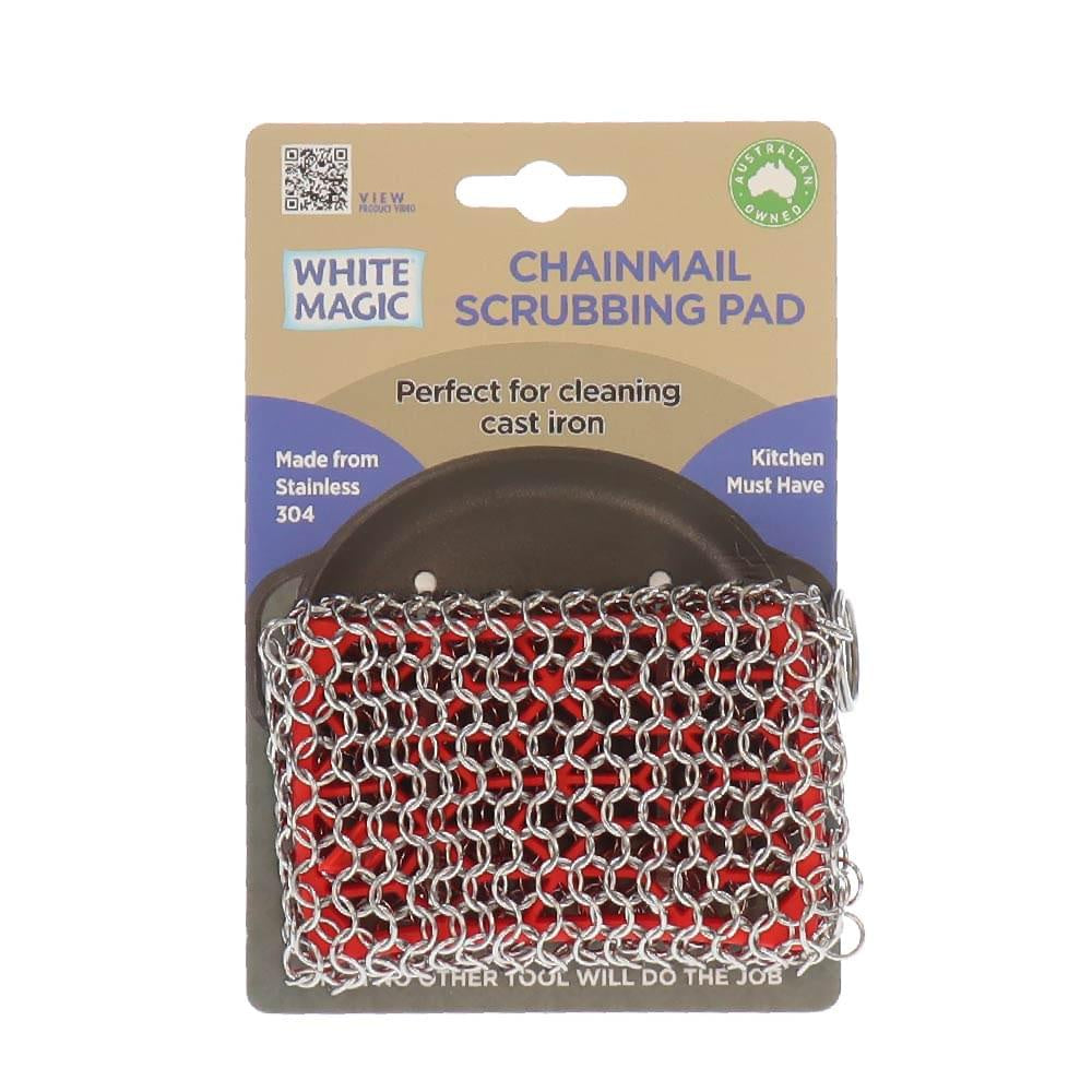 White Magic chainmail scrubbing pad in stainless steel, shown on its retail card